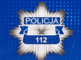 logo policji  z napisem 112