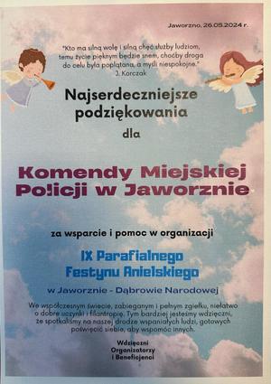 na zdjęciu grafika z podziękowaniami o treści:
Najserdeczniejsze podziękowania dla Komendy Miejskiej Policji w Jaworznie za wsparcie i pomoc w organizacji IX Parafialnego Festynu Anielskiego